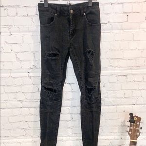 Men’s black denim skinny jeans, distressed.